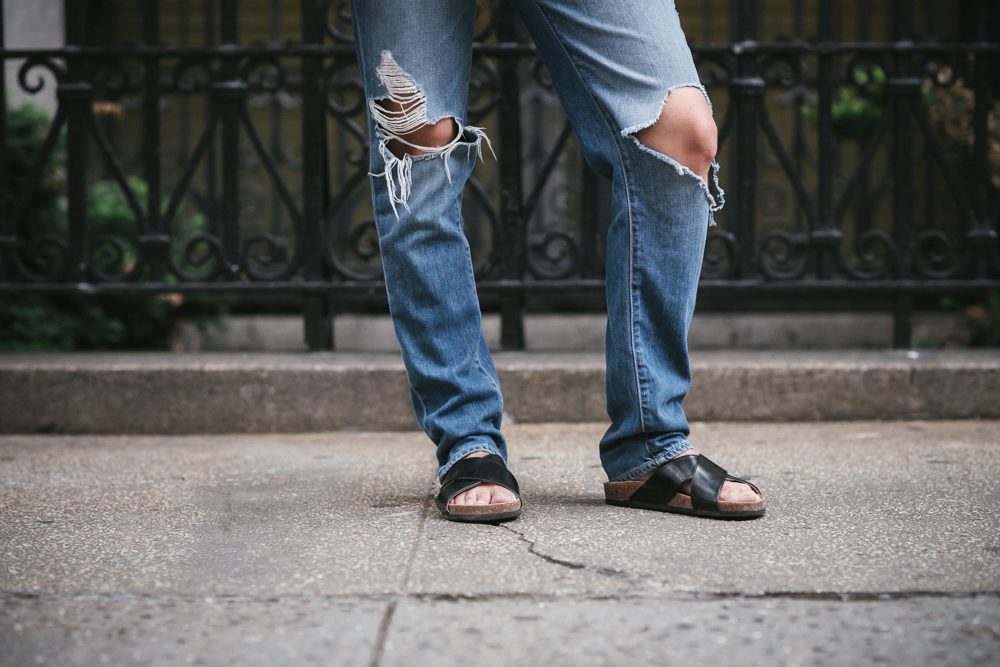 Ripped jeans and slides