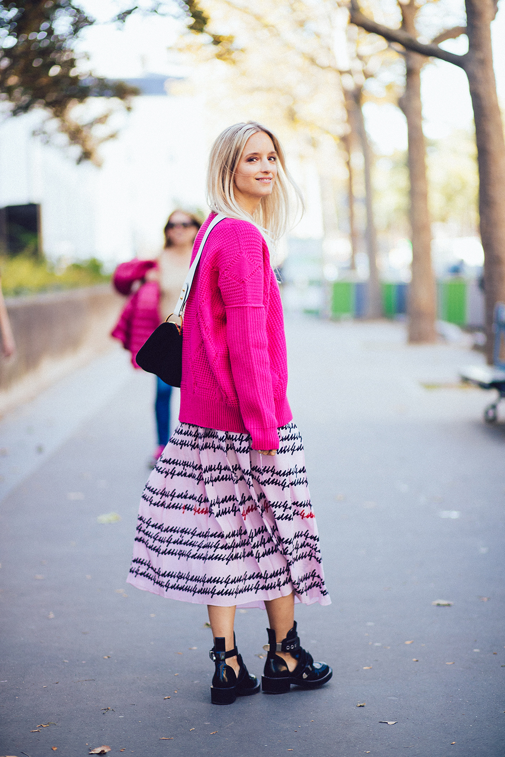 Charlotte Groeneveld from Thefashionguitar in Gucci pleated skirt and Balenciaga boots